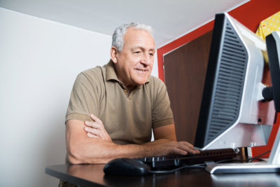 Senior man using a computer